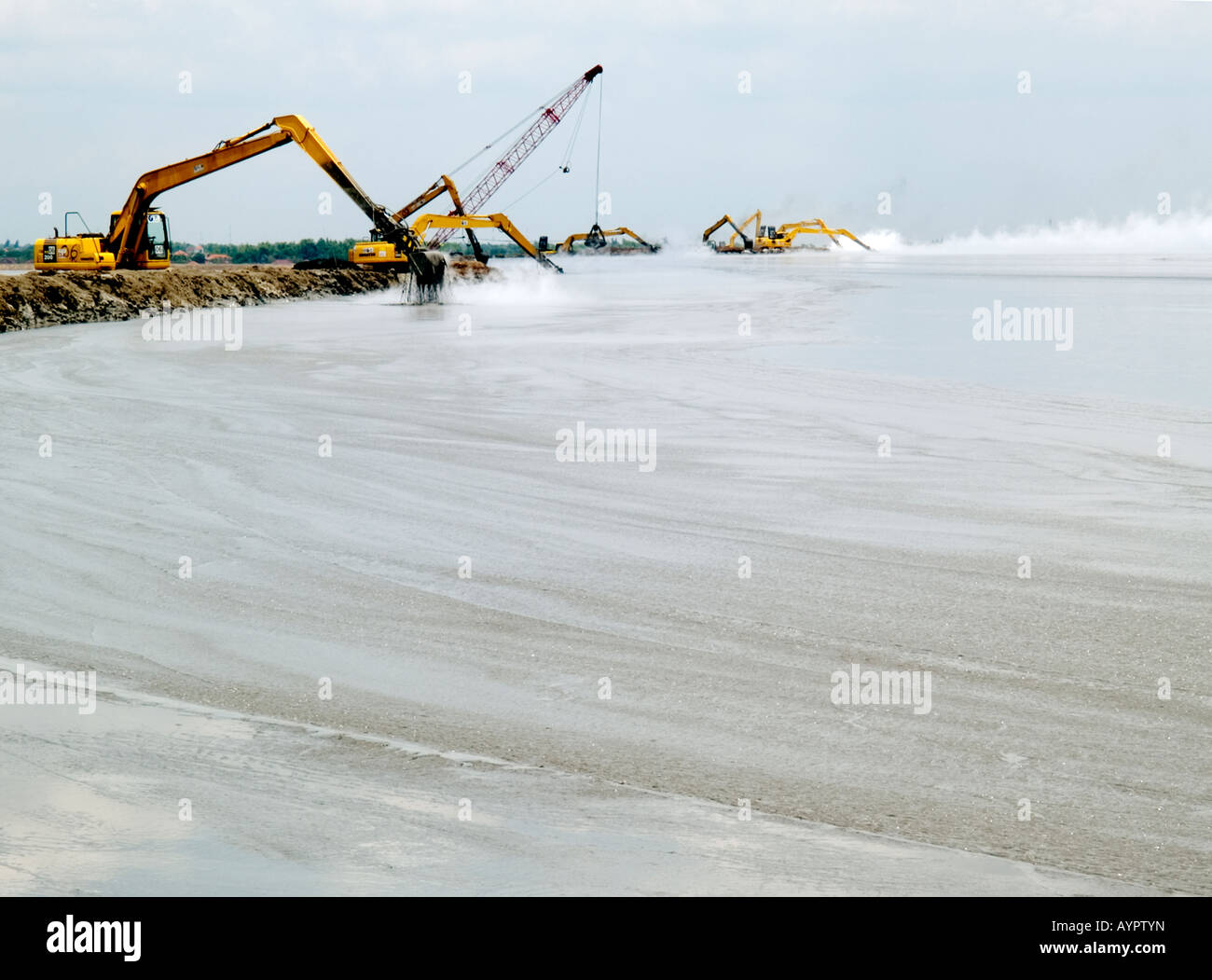 Dredgers battle in vain to clear away the hot mud erupting from the ground in the disaster at Sidoarjo,East Java,Indonesia Stock Photo