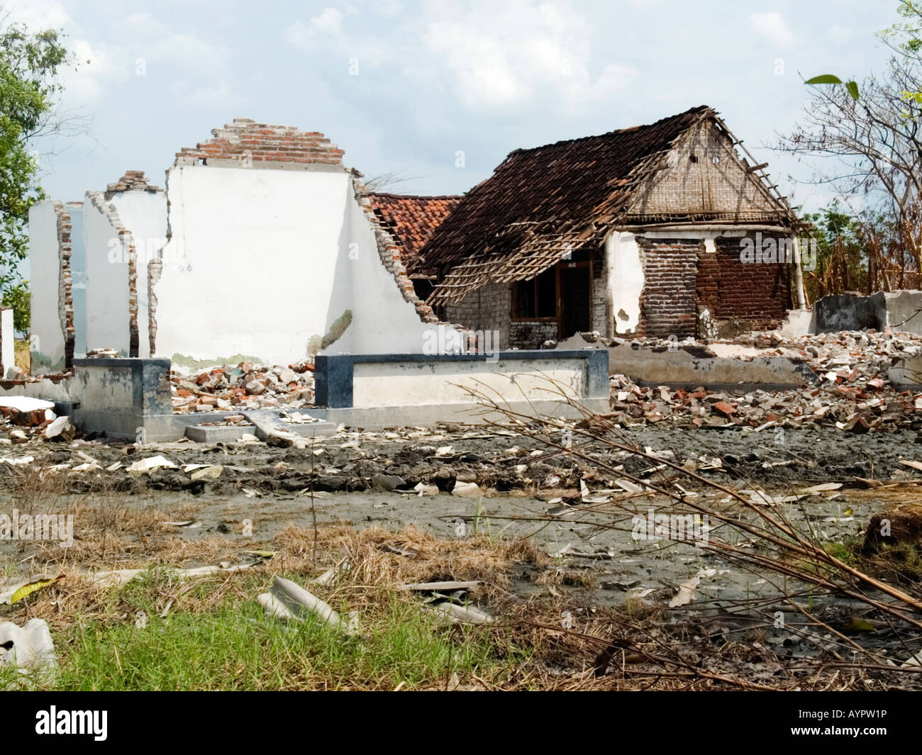 Derelict abandoned house at the edge of the hot mud disaster,Sidoarjo,East Java,Indonesia. Stock Photo