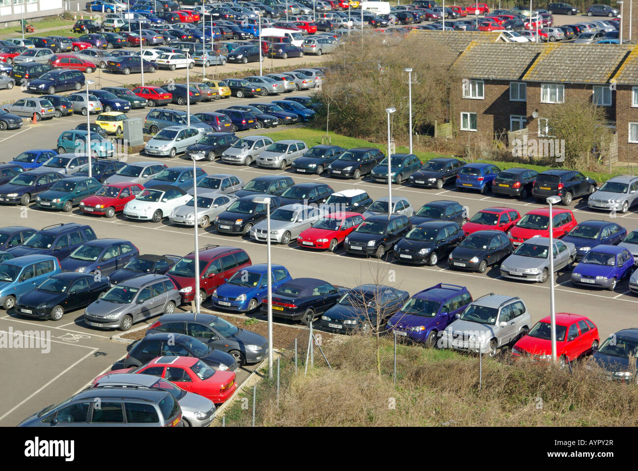 Aerial view of large full up busy hospital staff and visitor fee charging car park Basildon Essex England UK Stock Photo