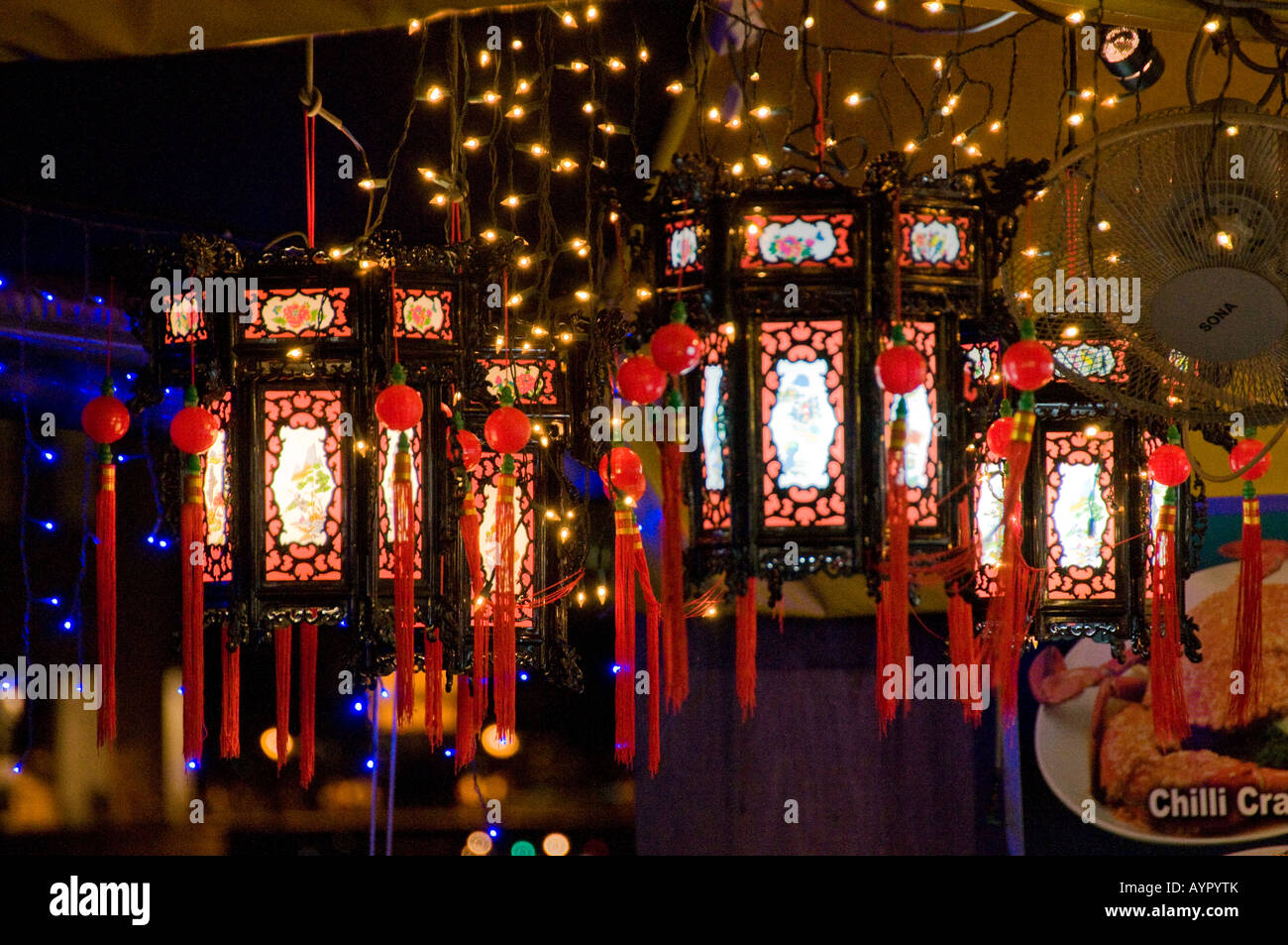 Paper Chinese lanterns hanging in restaurant in Singapore Stock Photo