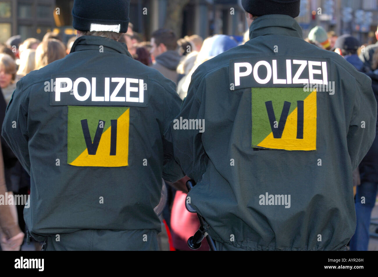 Two riot police officers from behind at a protest against the 2008 ...