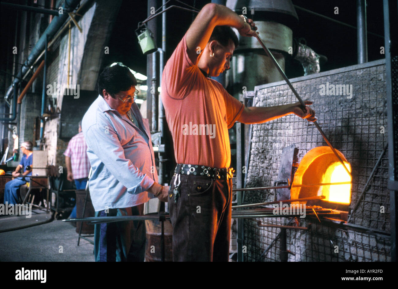 Glass blowers at work on the island of Murano Venice Italy Stock Photo