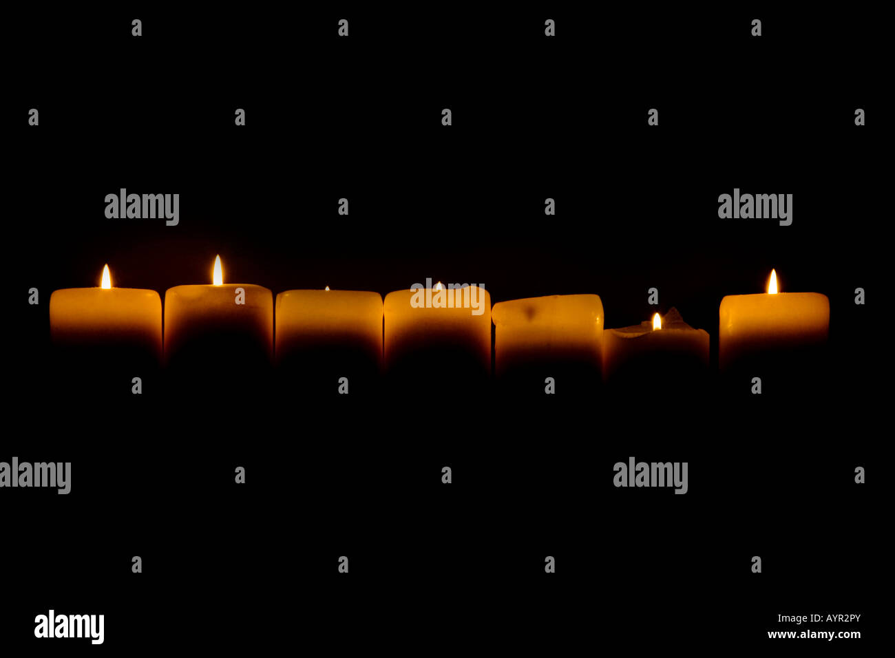 Premium Photo Closeup of lit candles