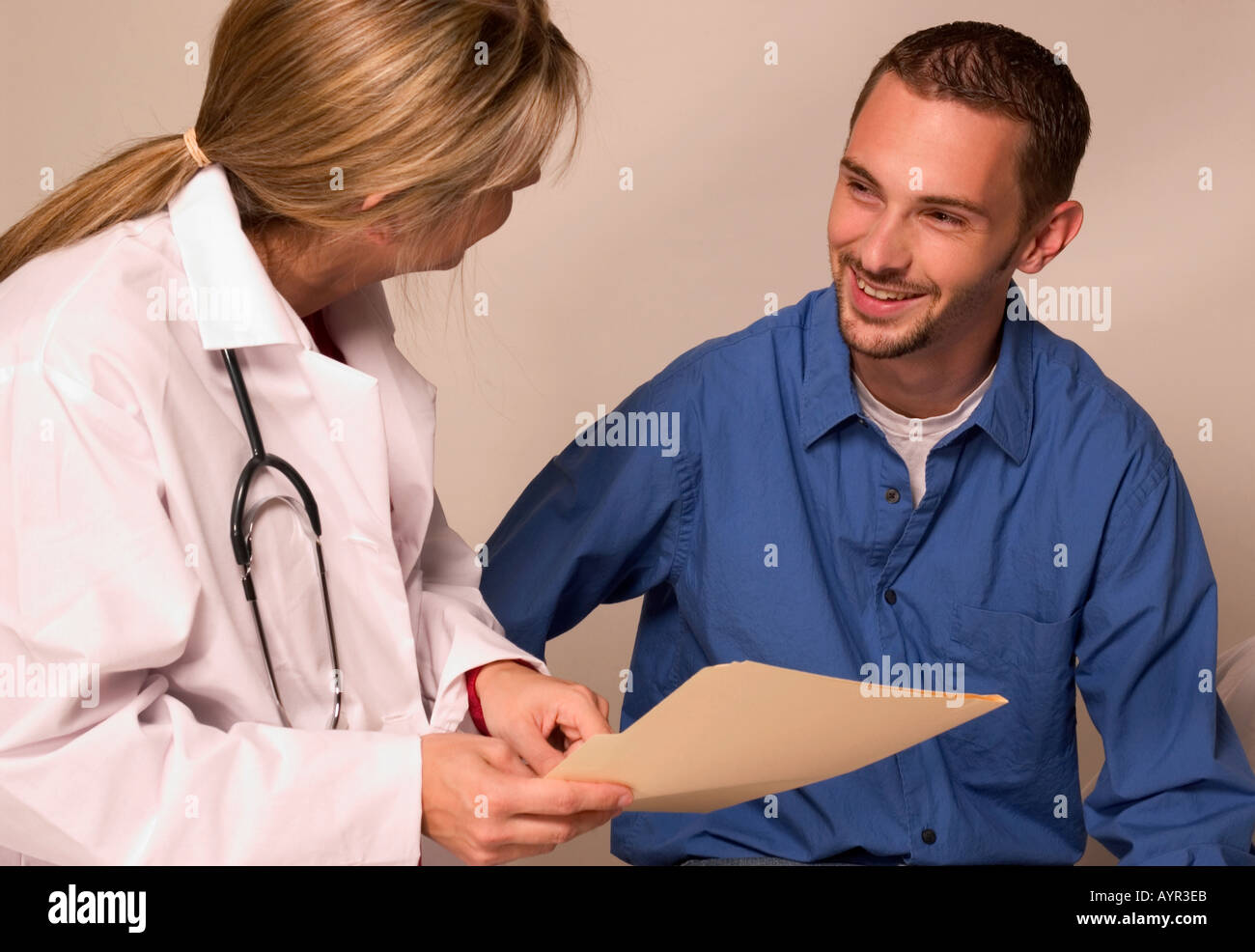 Female gp giving patient hi-res stock photography and images - Alamy
