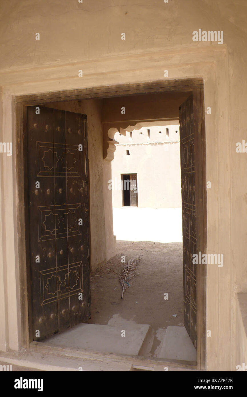Wooden door / entrance into the desert fortress at Al Mariyah, Liwa