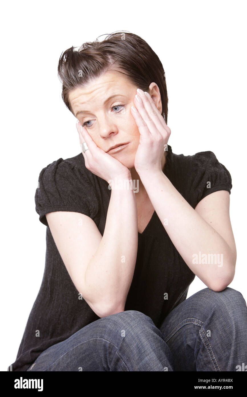 Woman looking sad, sideways glance Stock Photo