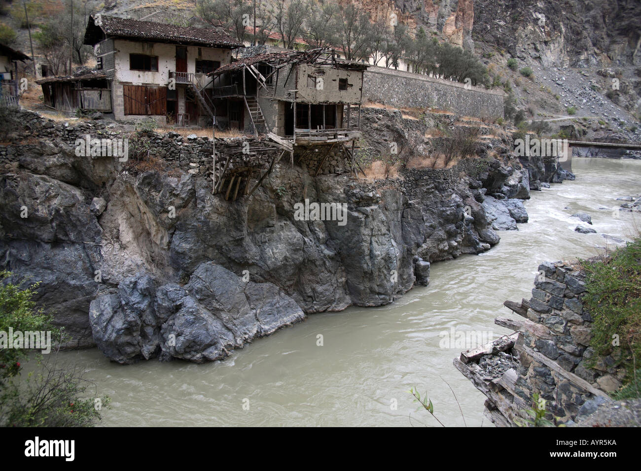 Ramshackle house on edge of river. Black Sea Coast, Turkey Stock Photo