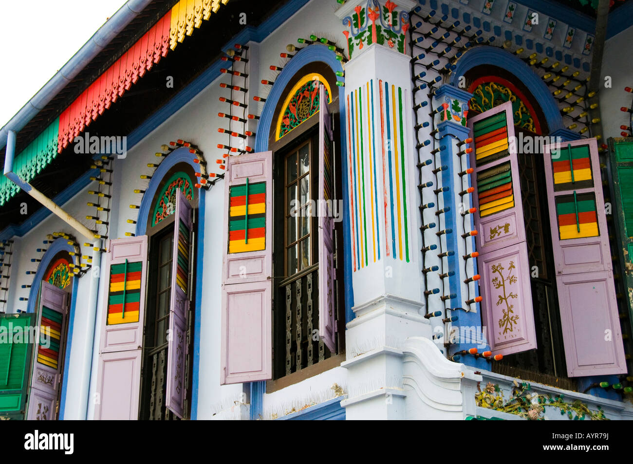 Picture of Four windows with shutters on second story apartment in Singapore Stock ...