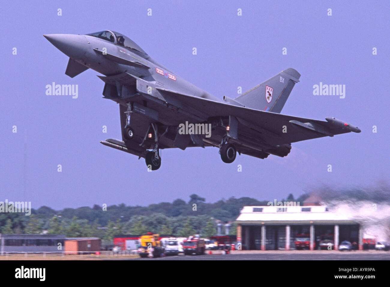 Typhoon F2 jet fighter aircraft operated by the RAF taking off at the Farnborough International Airshow. Stock Photo