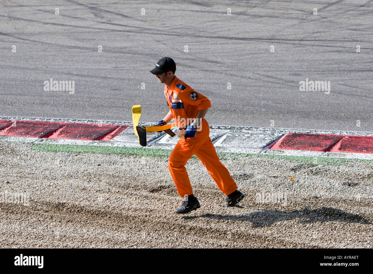 Track marshal aka course worker at work, racetrack Stock Photo
