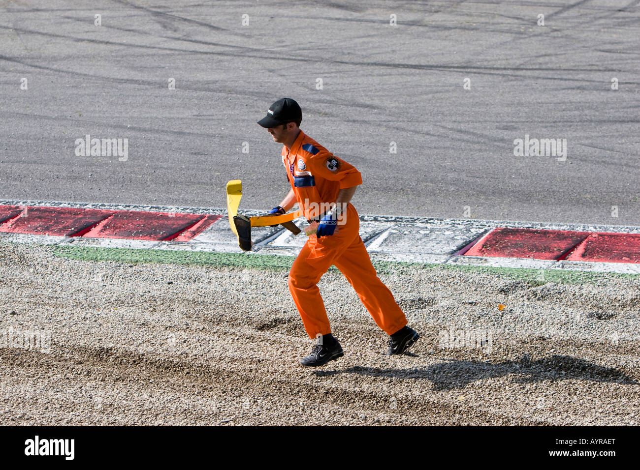 Track marshal aka course worker at work, racetrack Stock Photo - Alamy