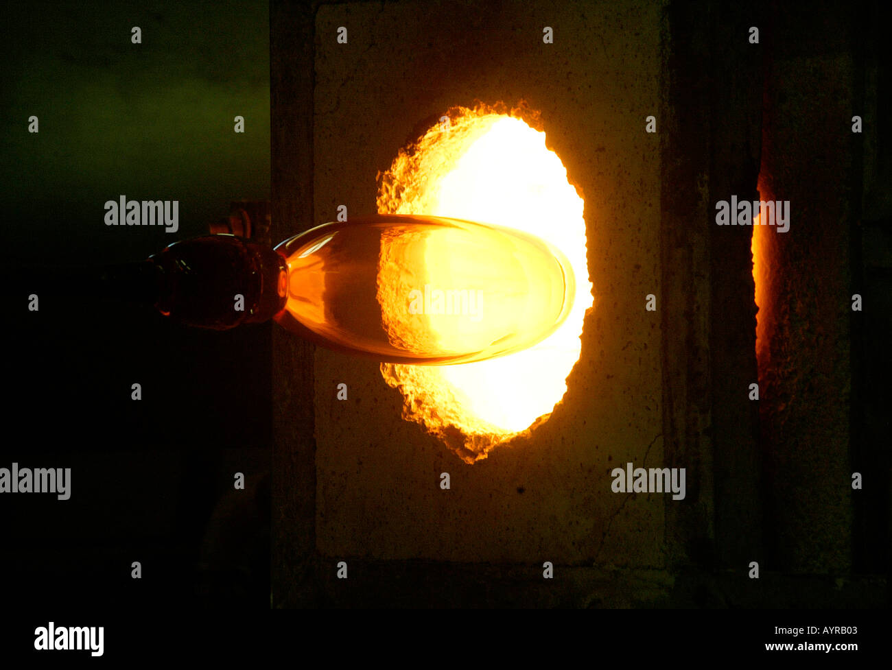 Molten glass being prepared in a kiln for a glass blowing demonstration