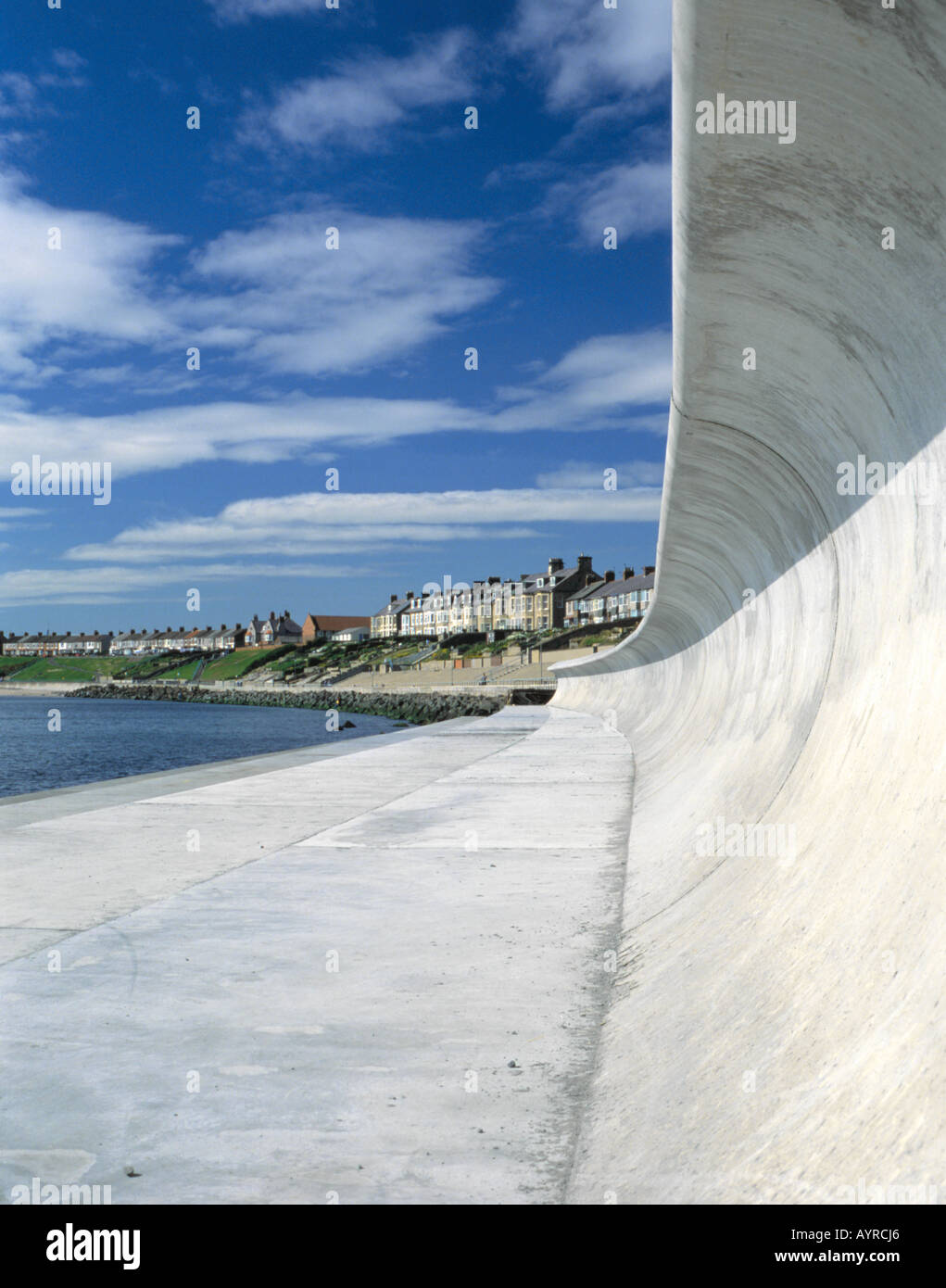 Coastal protection; reinforced concrete wave wall, Newbiggin-by-the-Sea, Northumberland, England, UK. Stock Photo