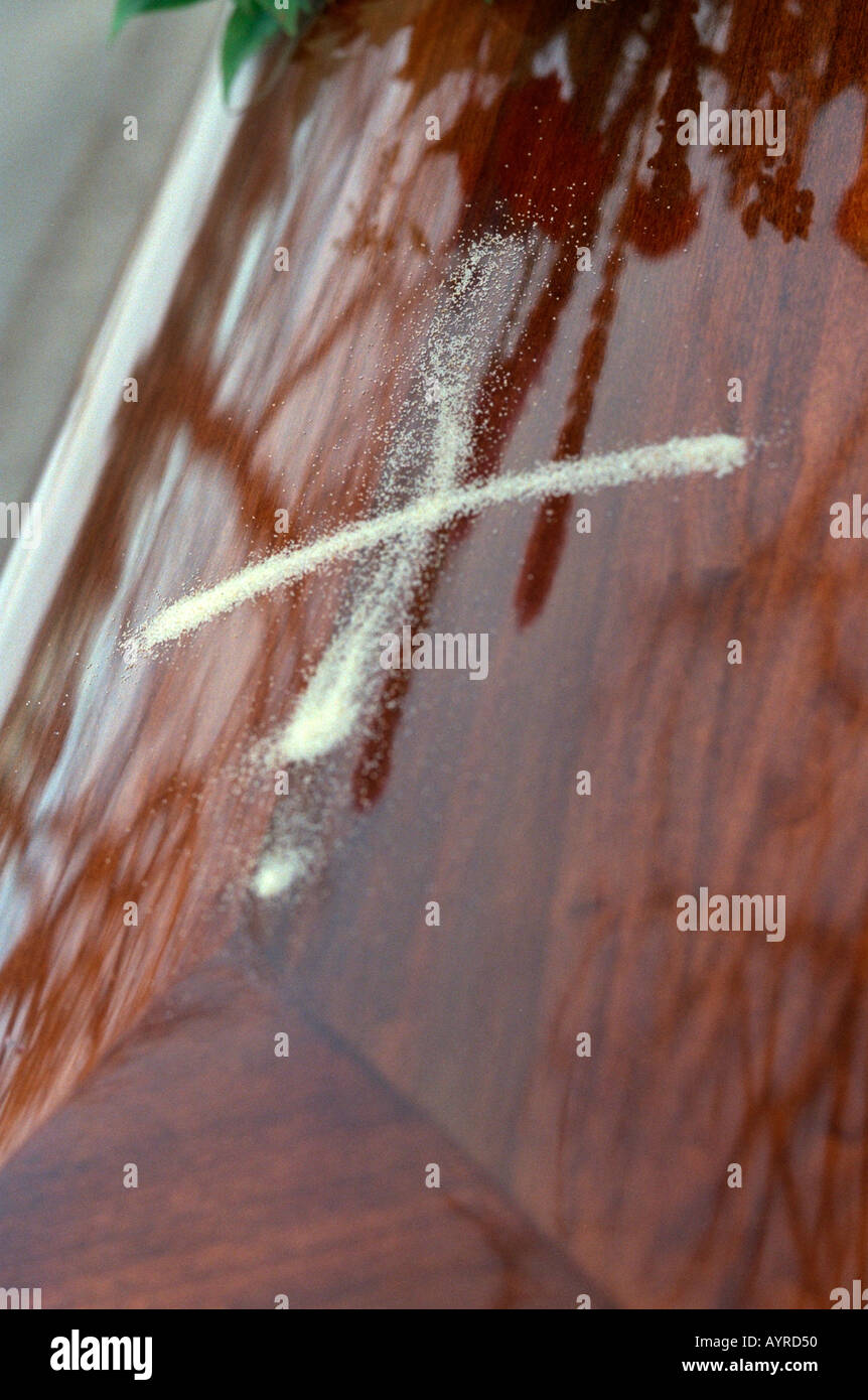 Casket with sand cross at cemetery. Buffalo Minnesota USA Stock Photo