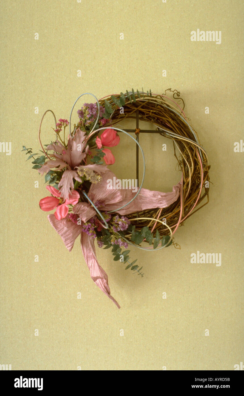 Cross within grapevine wreath with dried flowers. Minneapolis Minnesota USA Stock Photo