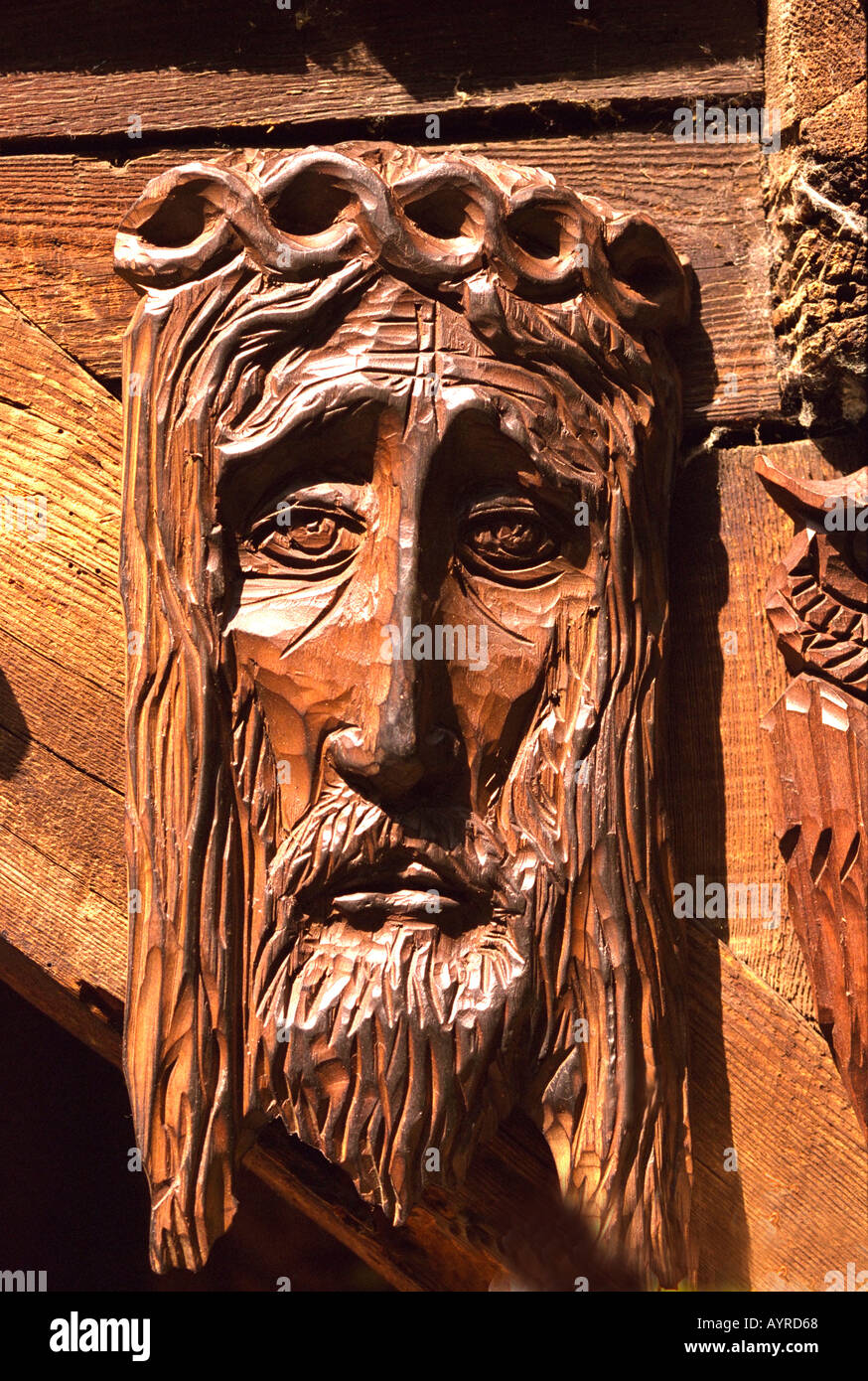 Wooden carving of the face of Jesus at outdoor market. Biskupin Poland