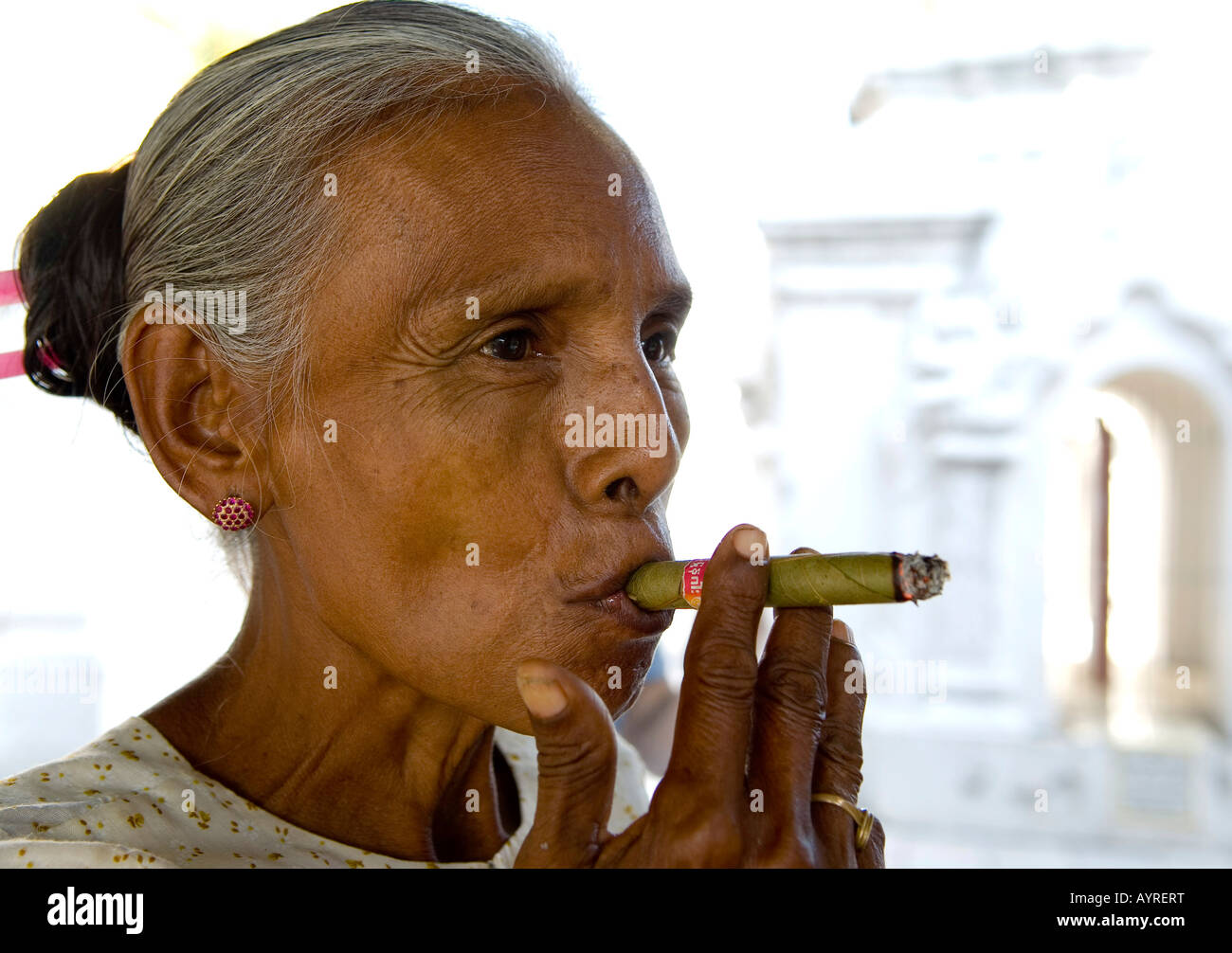 Old woman smoking, Mingun, Mandalay, Myanmar (Burma), Southeast Asia Stock Photo
