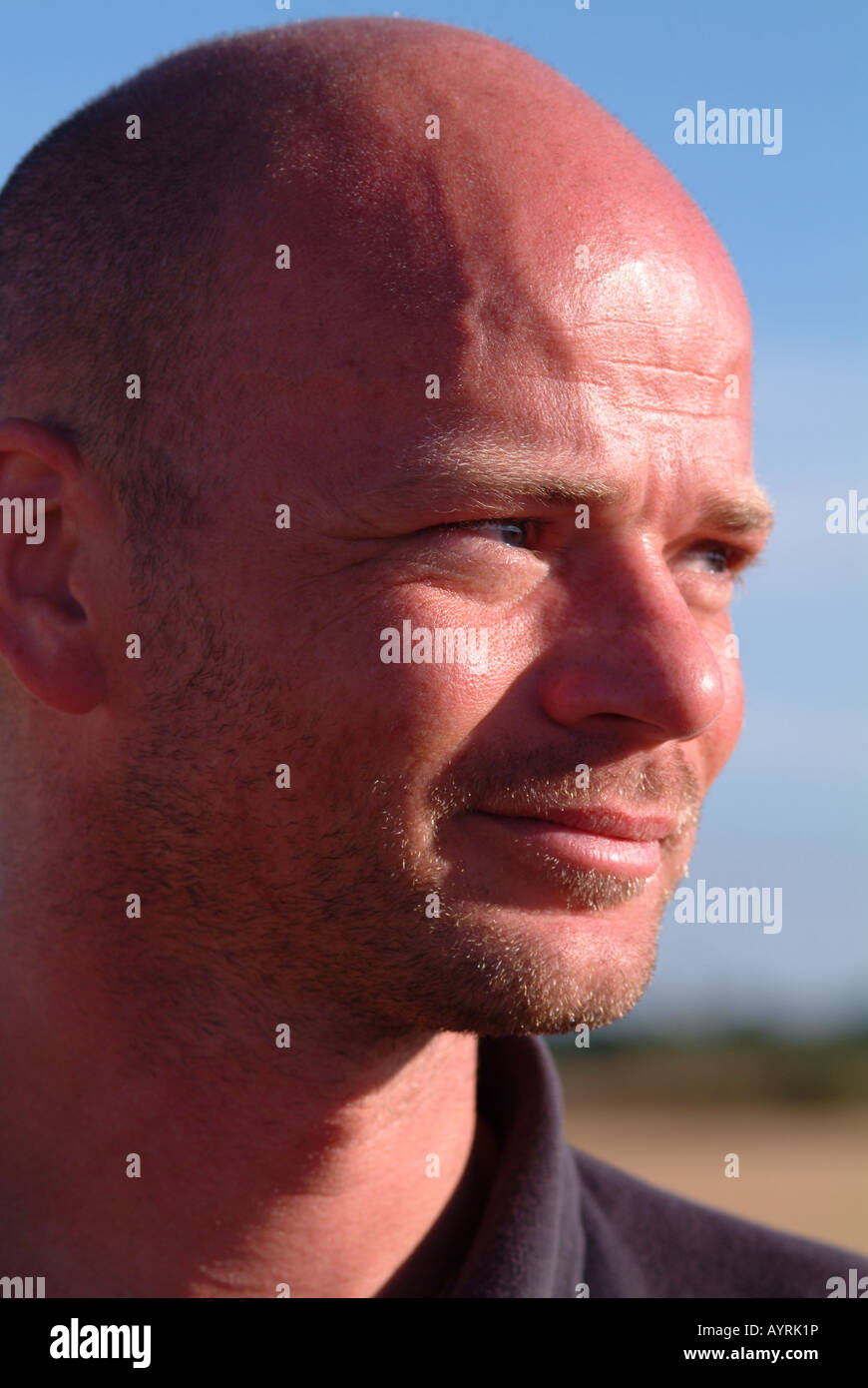 Portrait Of A Man With A Bald Head Stock Photo - Alamy