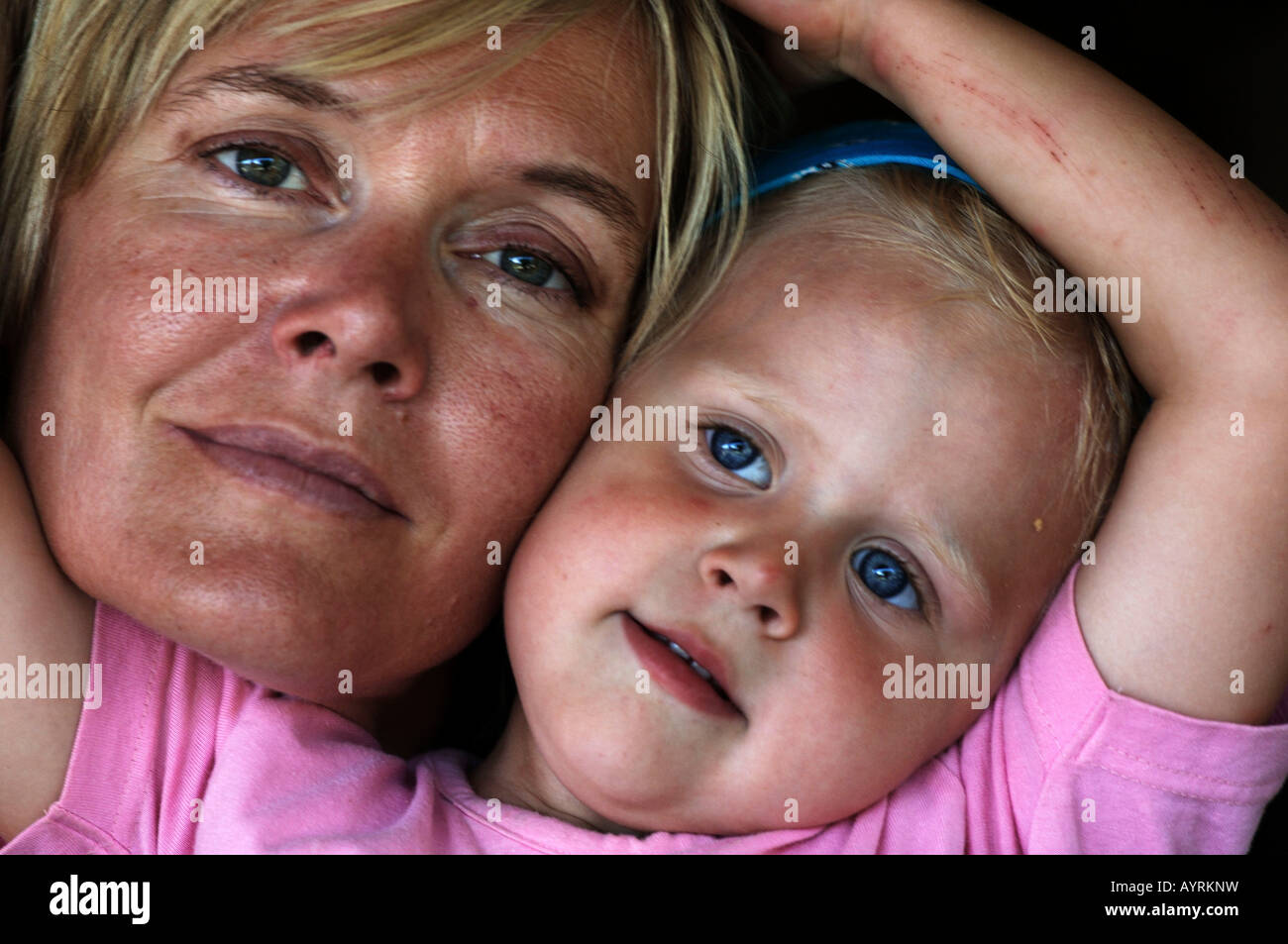 Three year old girl and her mother Stock Photo