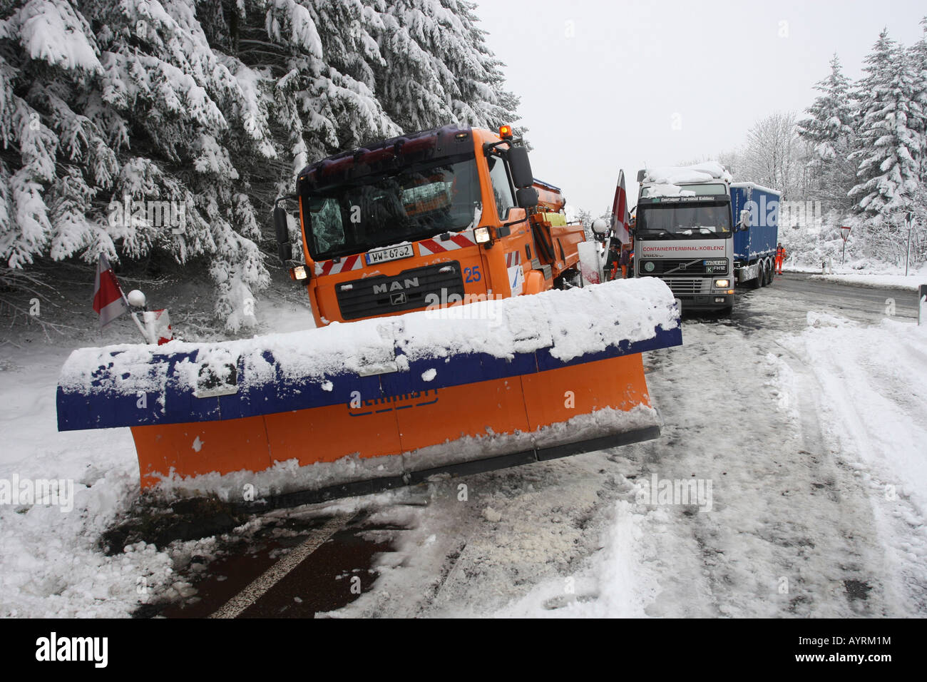 Snowplough on the side of a highway in Germany, Europe Stock Photo