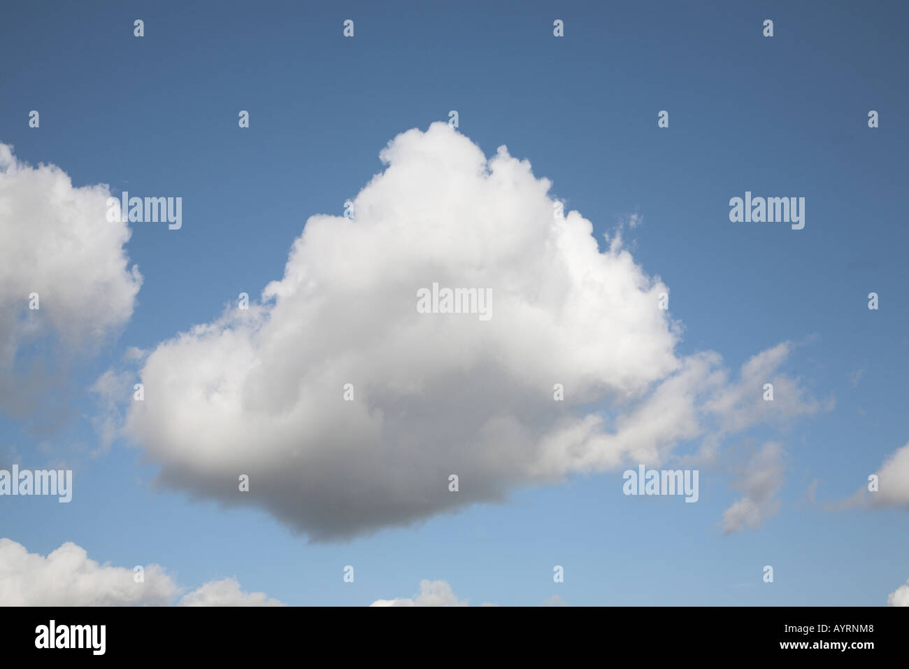 Fluffy white cumulus clouds in blue summer sky Stock Photo - Alamy