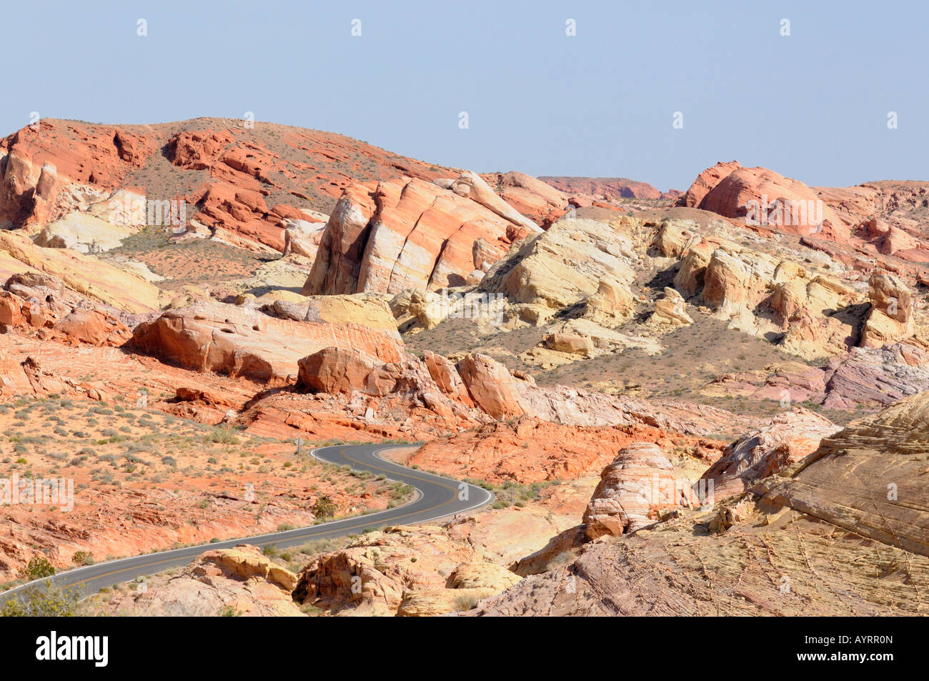 A road winding through rocky desert Stock Photo