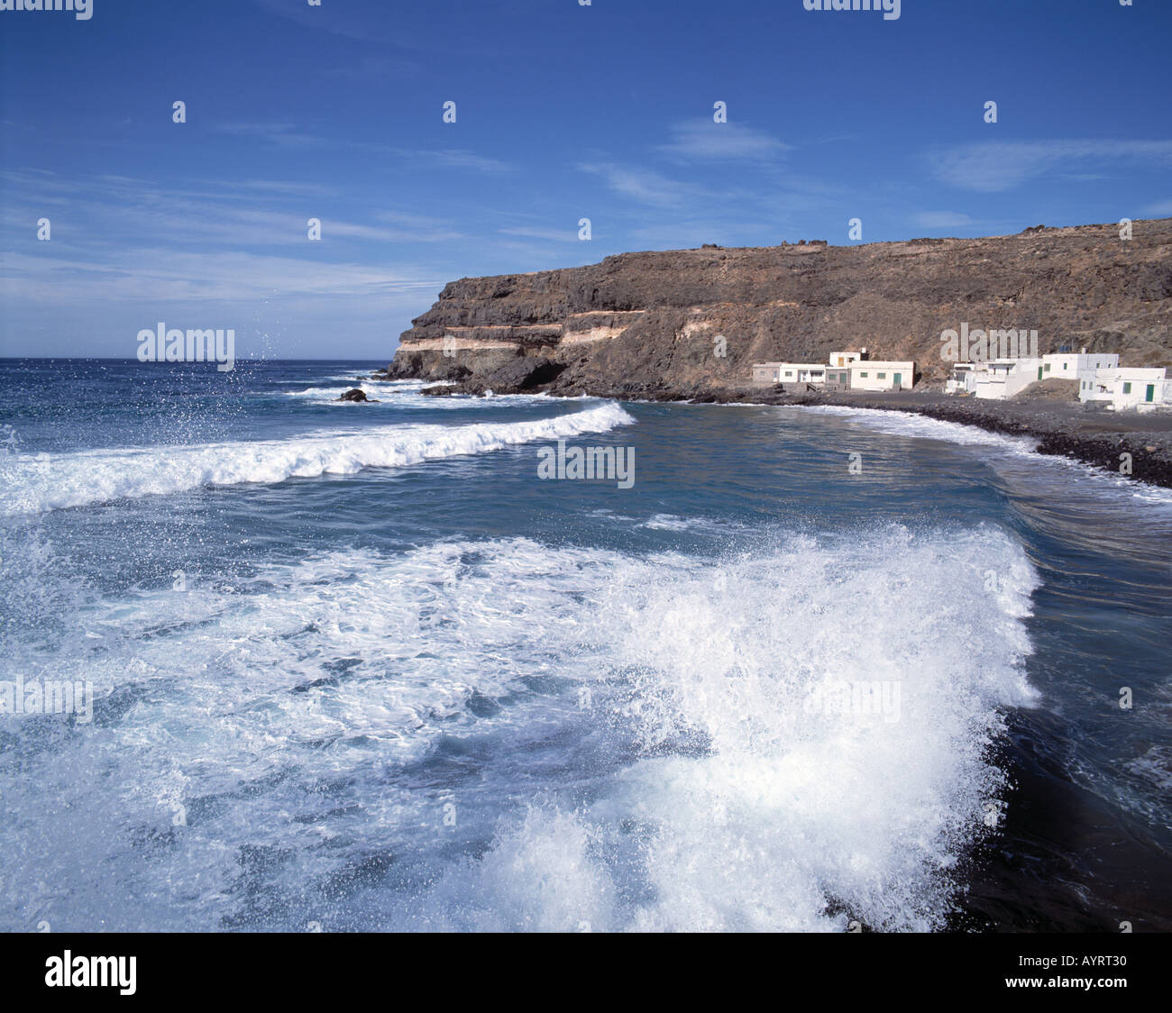 Kuestenlandschaft, Felsenkueste, Meeresbucht, Fischerdorf, Brandung, El Cotillo, Fuerteventura, Kanarische Inseln Stock Photo