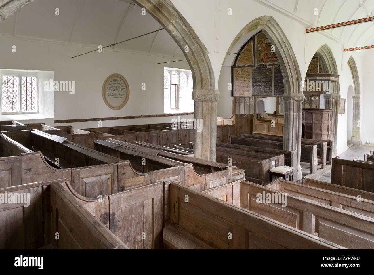 The 18th century pews and interior of the old church of St Petrock (Petroc) at Parracombe, Exmoor, Devon Stock Photo