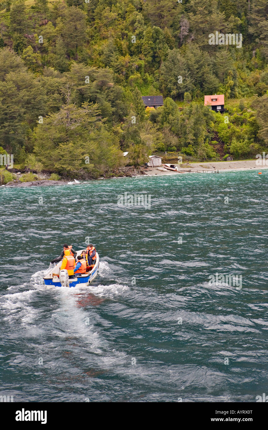 The only way to reach the isolated houses on Lago Todos los Santos (All Saints' Lake) is by boat, Vicente Pérez Rosales Nationa Stock Photo