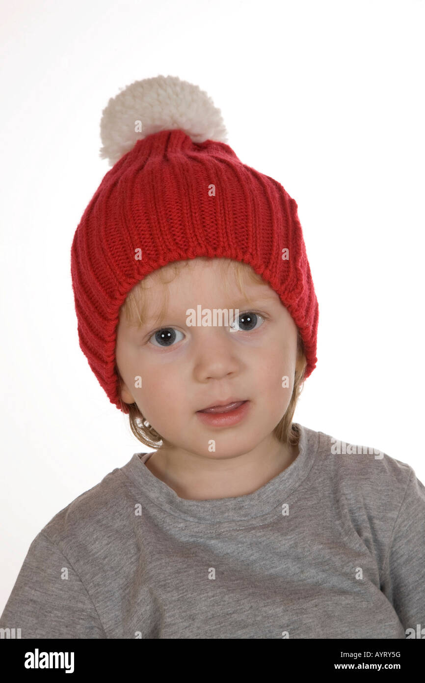 Portrait of a twoyearold boy wearing a knit hat Stock Photo Alamy