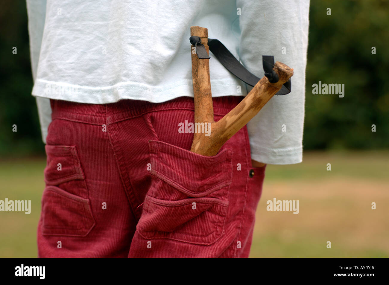 Catapult or slingshot in a childs back pocket Stock Photo
