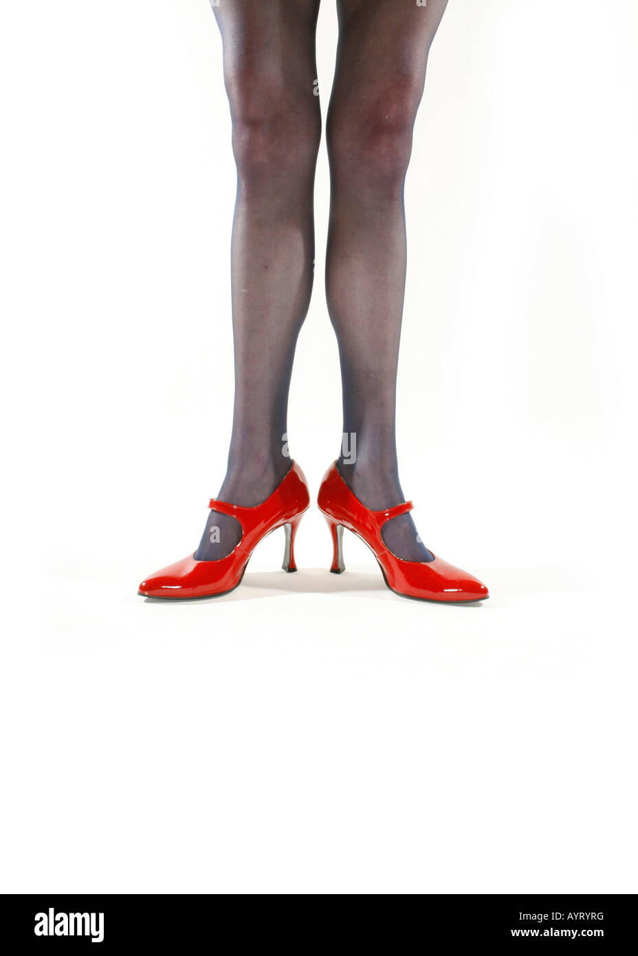 Womans legs in red high heels Stock Photo