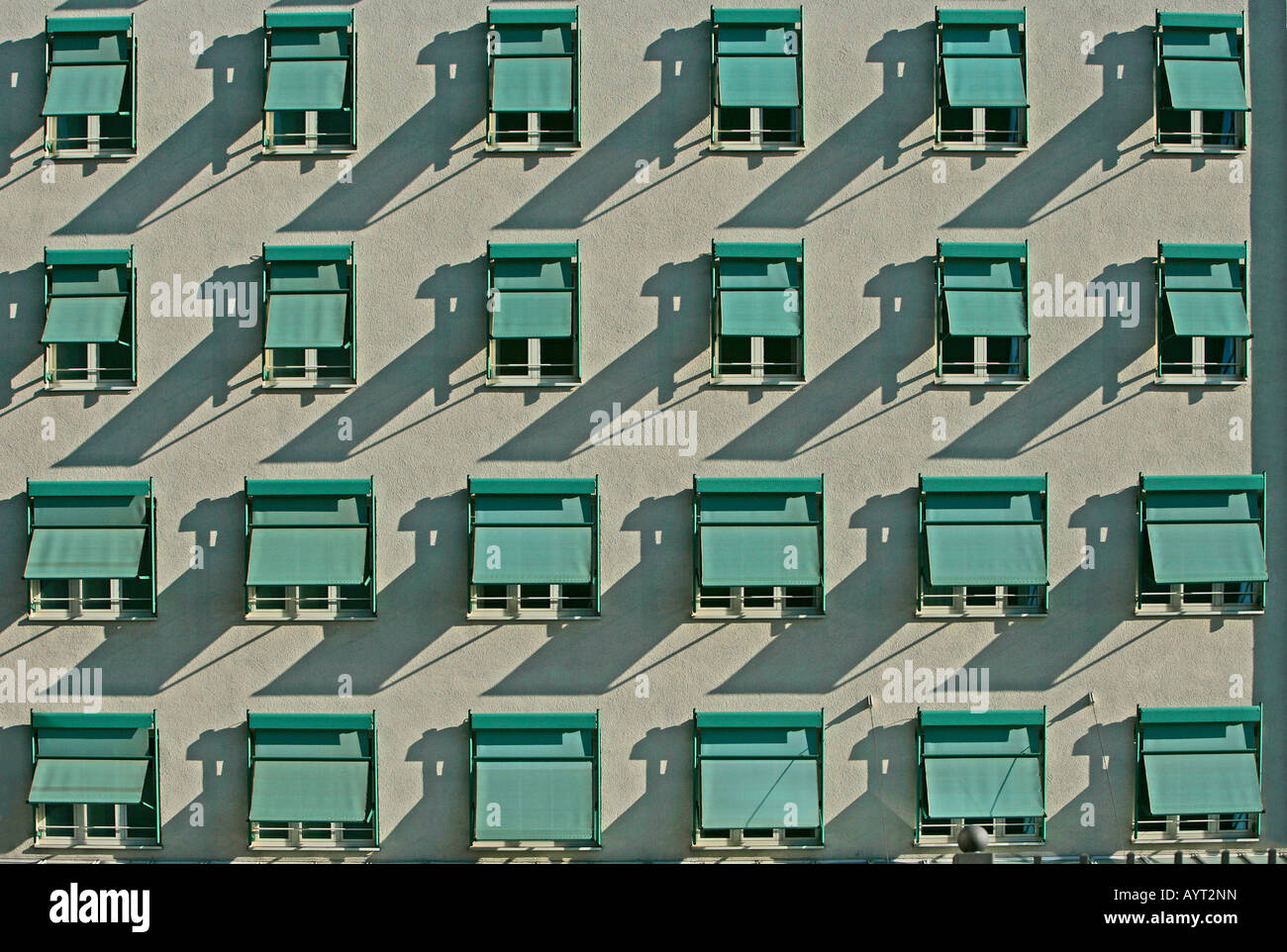 Building facade, shutters on the windows, front view Stock Photo