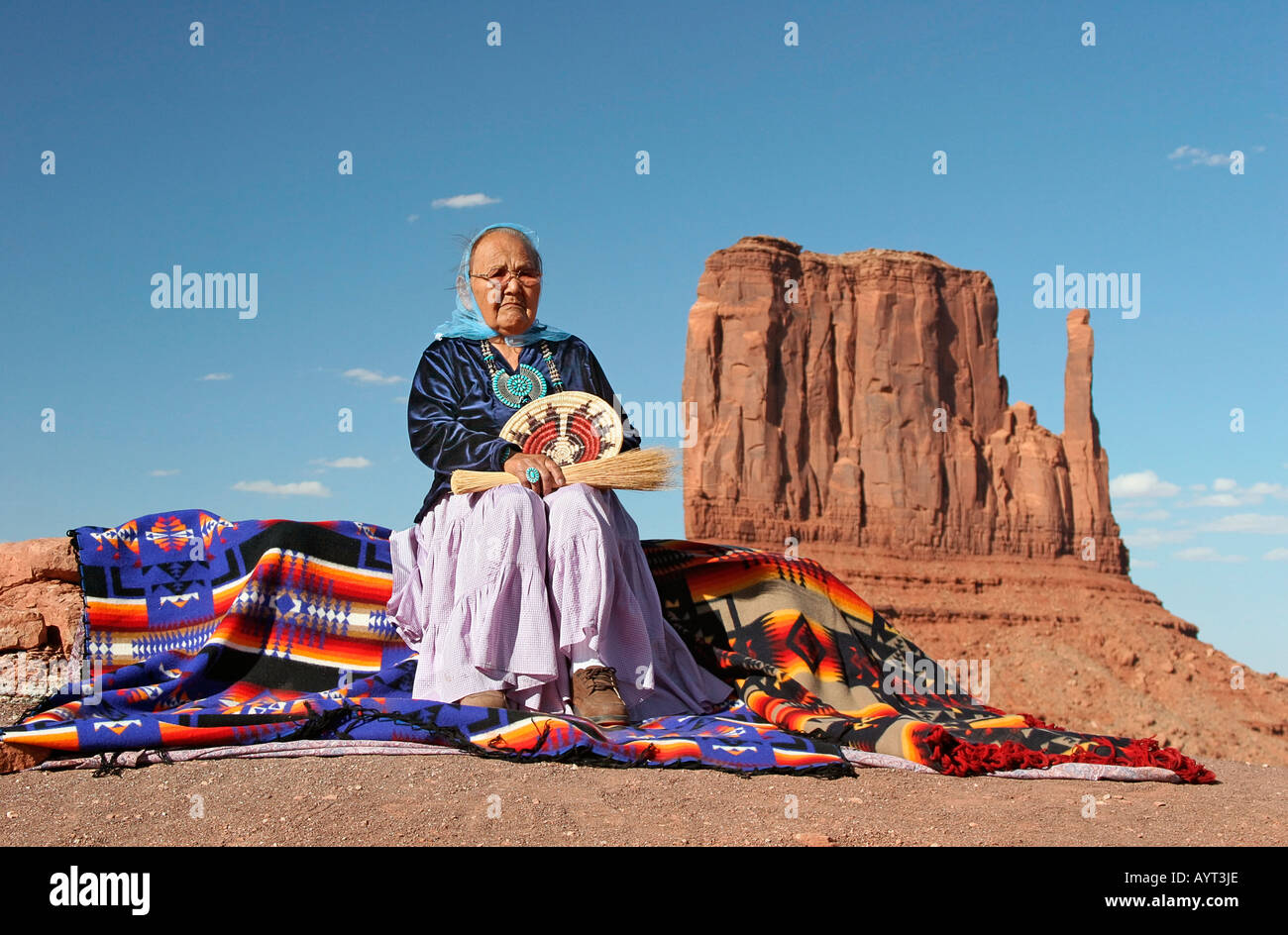 Navajo elder woman in traditional dress at Monument Valley Stock Photo