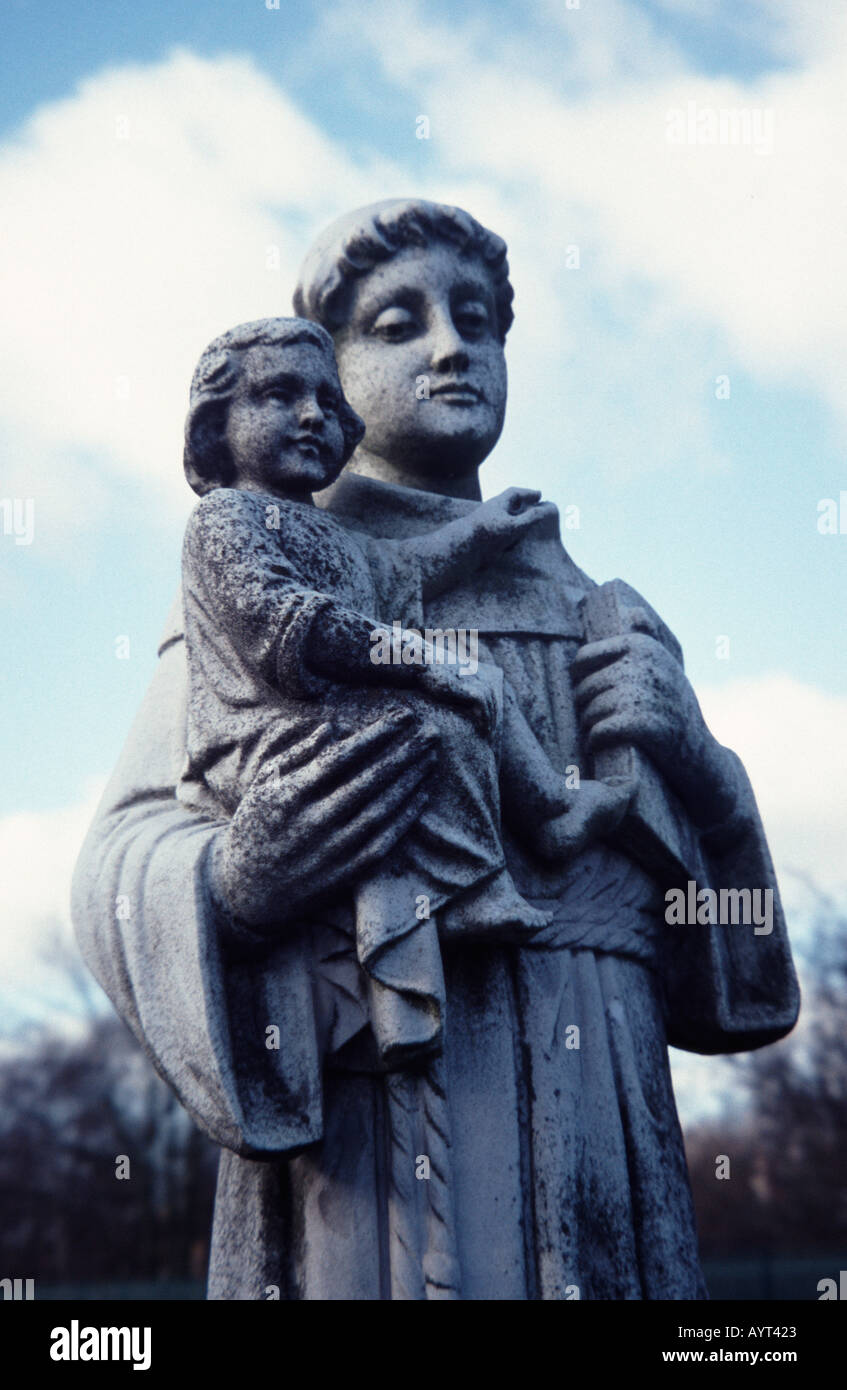 Statue of St Christopher carrying baby Jesus in Kensal Green Cemetery
