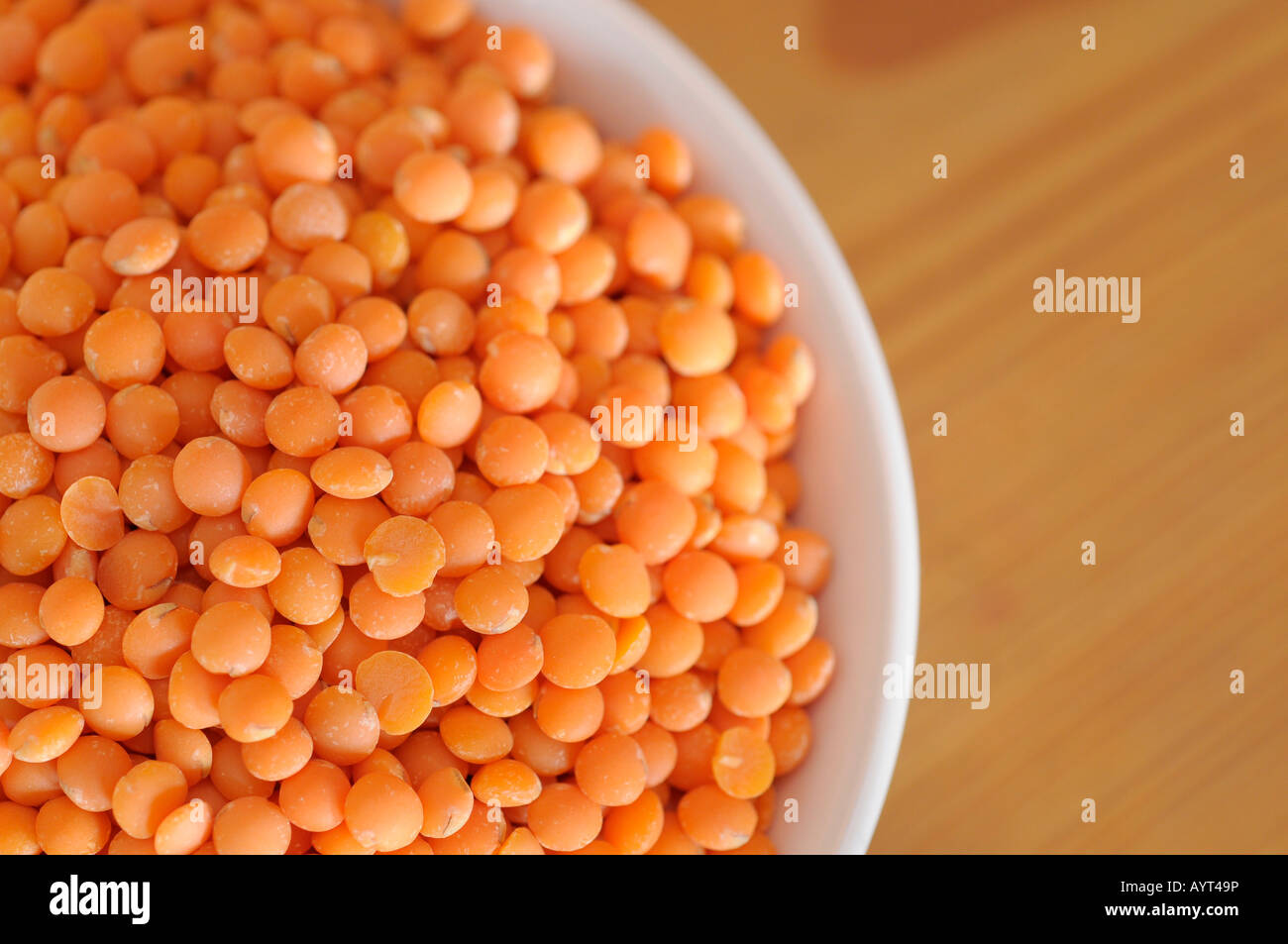 Red lentils (Lens esculenta) in a bowl Stock Photo - Alamy