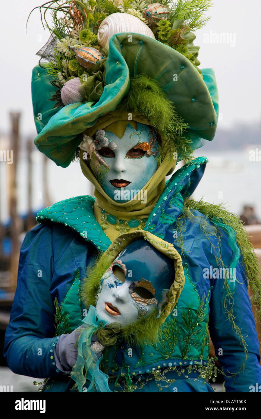 Blue and green costume and mask, Carnevale di Venezia, Carneval in Venice,  Italy Stock Photo - Alamy