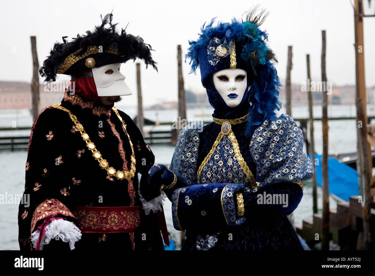 Two colourful costumes and masks, Carnevale di Venezia, Carneval in Venice, Italy Stock Photo