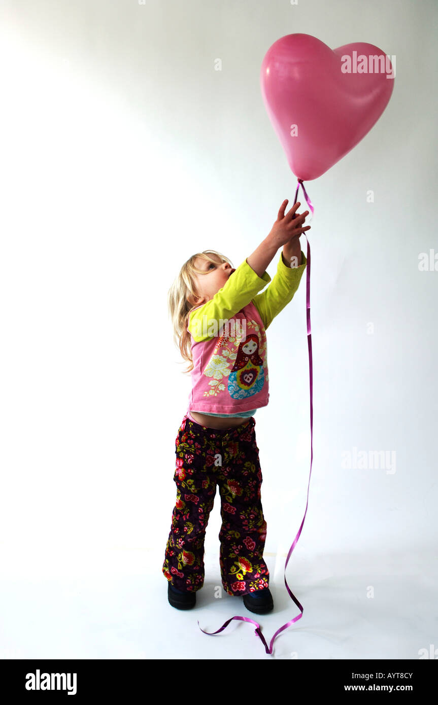 Child holding symbol love hi-res stock photography and images - Alamy