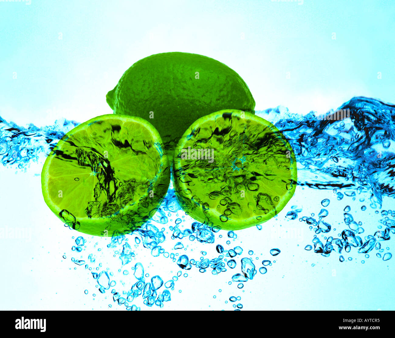 Two limes floating in the water Stock Photo Alamy