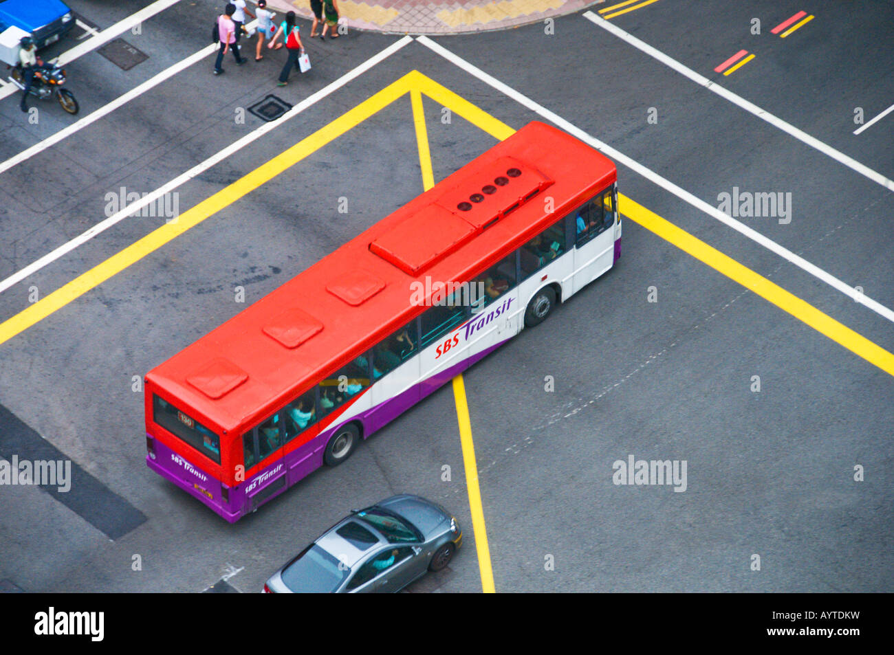 vehicles crossing street intercestion Stock Photo