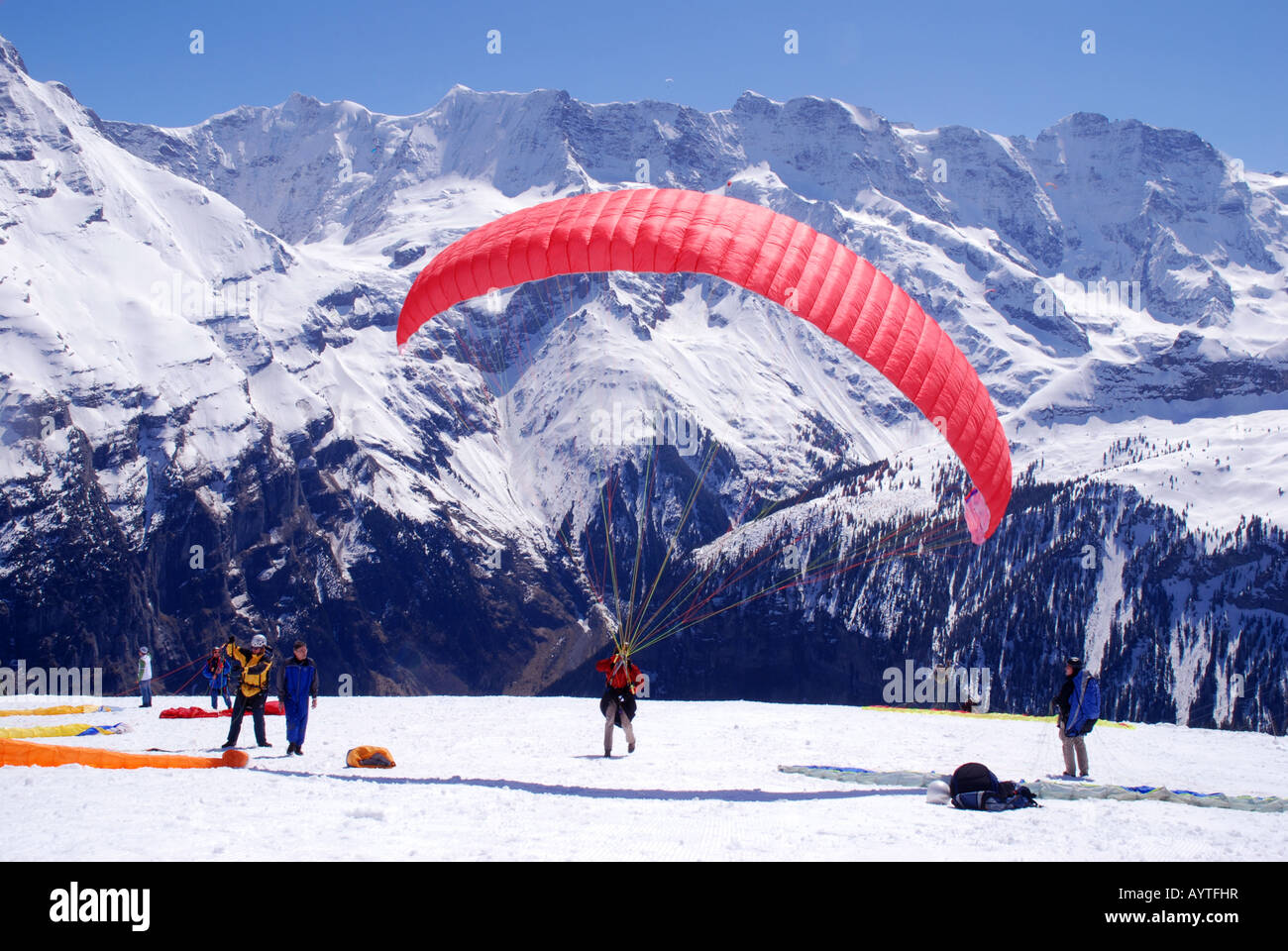 Parasailer starting at Mürren Schilthorn winter Bernese alps above Lauterbrunnen Switzerland Stock Photo