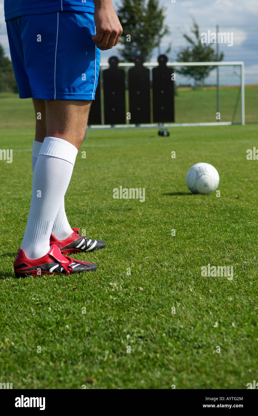 Kicker exercising free kick Stock Photo Alamy