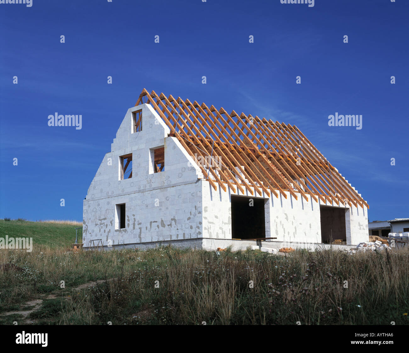 site, one-family house, outside finish, roof timbering Stock Photo