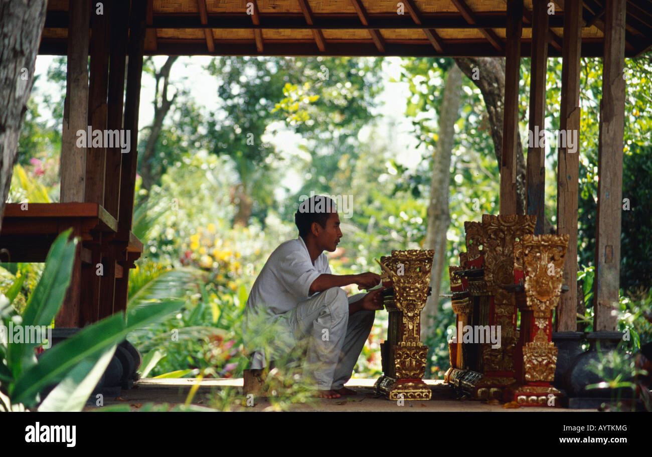 A Balinese xylophone player practises for the local gamelan orchestra