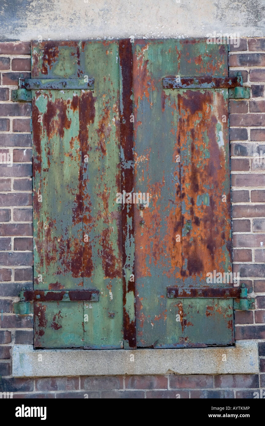 Shuttered window of old factory Stock Photo