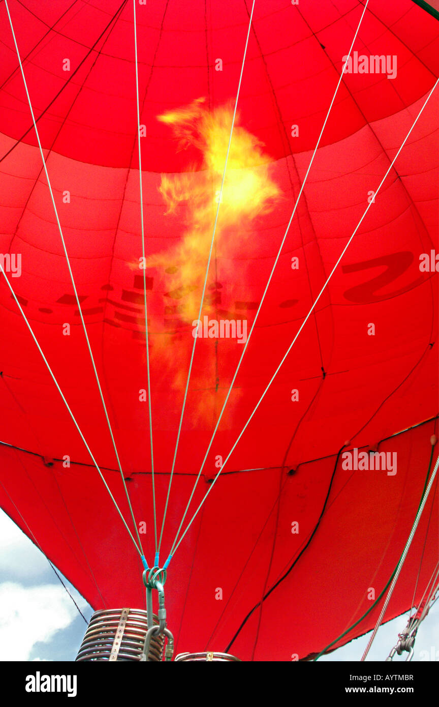 Gas flame burn blow inflate hot air red balloon Stock Photo Alamy
