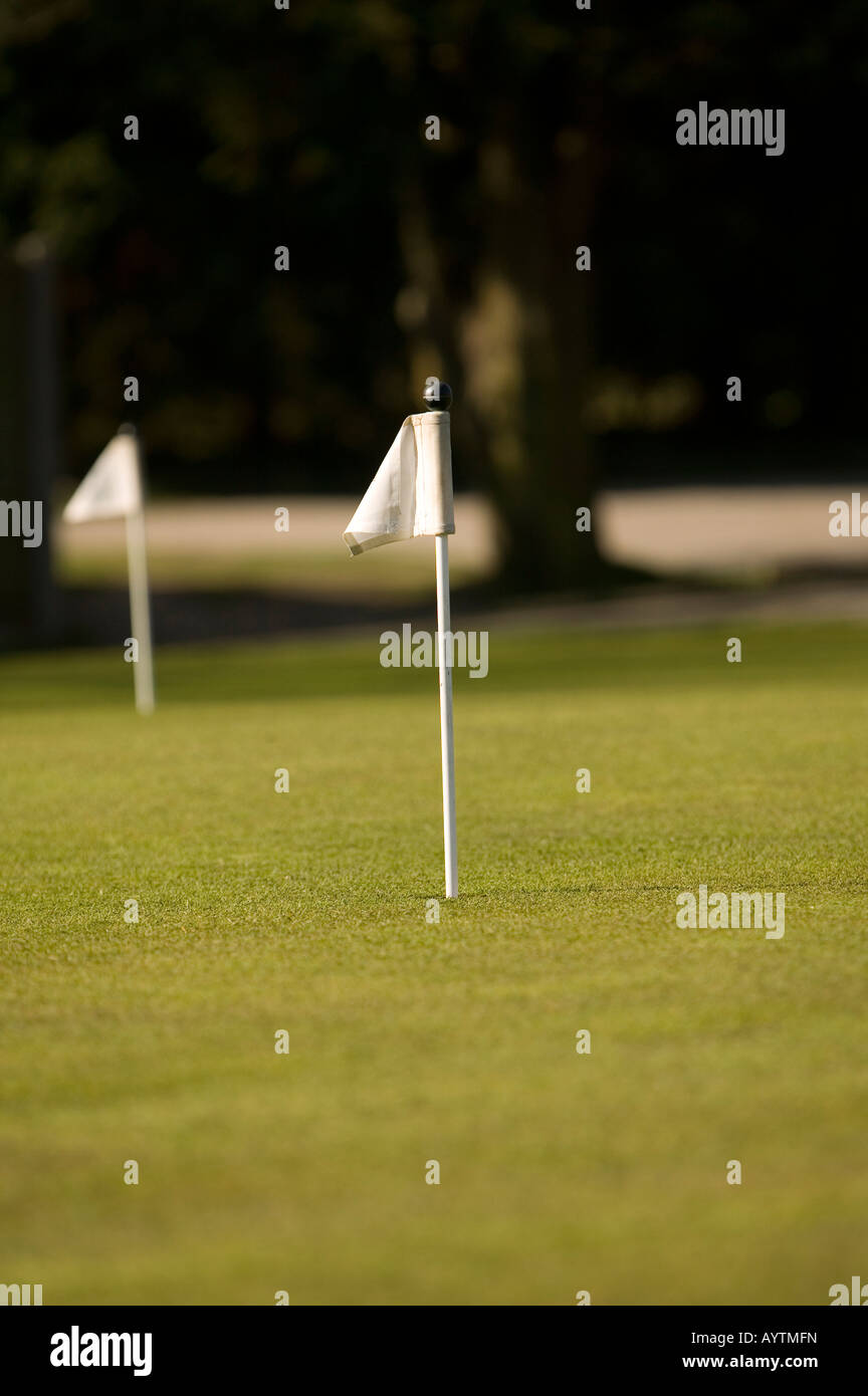 White flags on a golf course green in England UK Stock Photo Alamy
