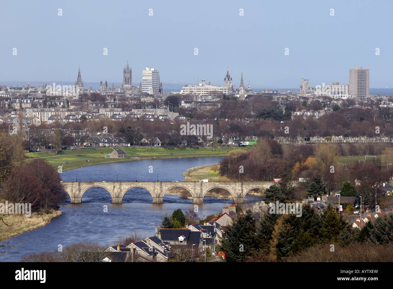 The Bridge of Dee over the River Dee with the oil rich city of Aberdeen, Scotland, in the background Stock Photo