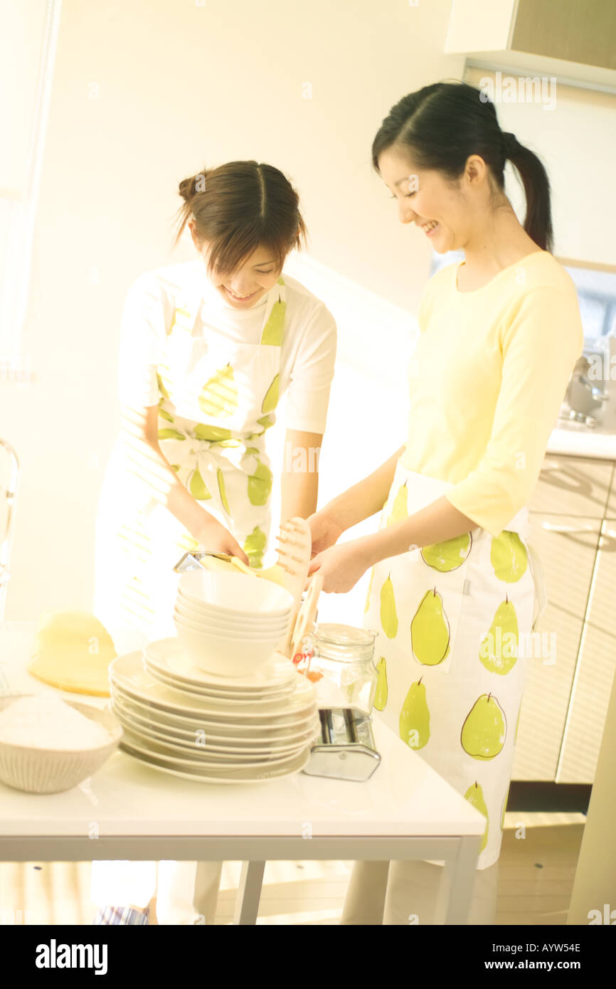 Two women in the kitchen Stock Photo
